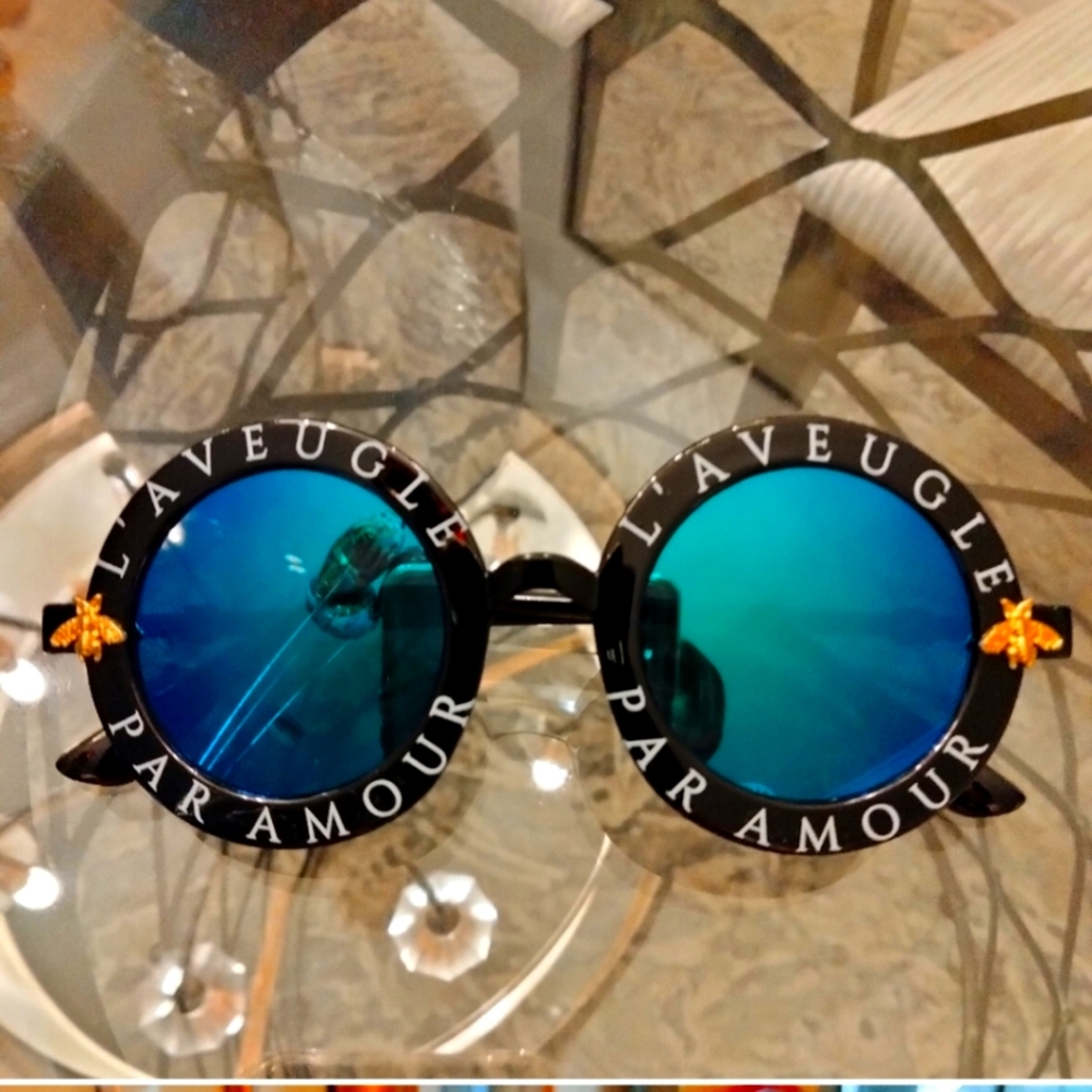 NWOT French inspired sunglasses with blue mirrored lenses and gold bee accents.